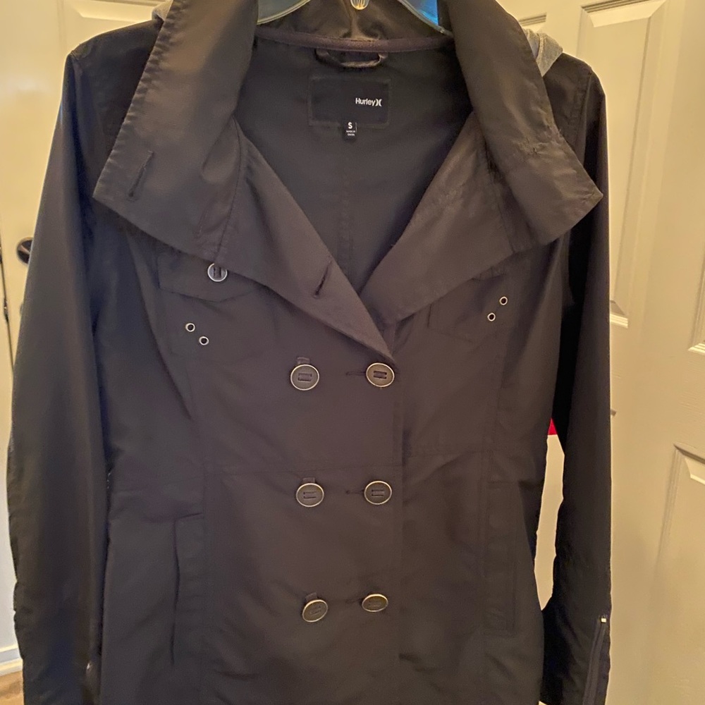 Women’s size small button up Black Hurley jacket.
